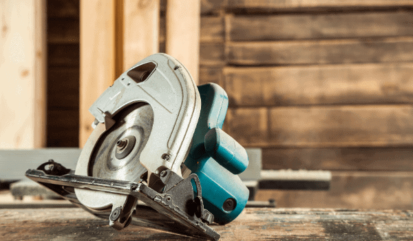 circular saw on a wooden table